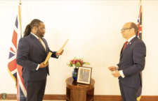 Newly appointed magistrate, Hakim Creque (left) and governor Daniel Pruce.